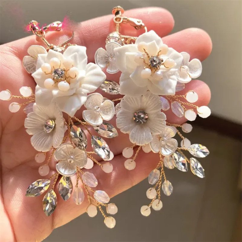 Handgemaakte trouwoorbellen met strass Rosea Handgemaakte trouwoorbellen met strass Rosea