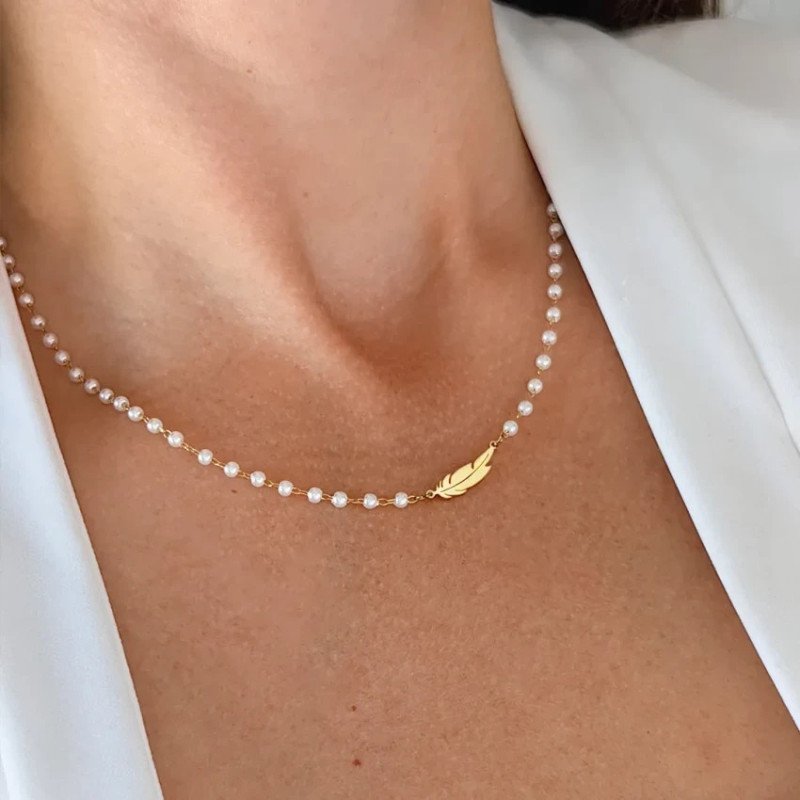 Roestvrijstalen ketting FEATHER parels wit goud Roestvrijstalen ketting FEATHER parels wit goud